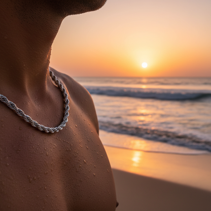 man wearing silver rope chain, below neck
Sunset beach background
2048x2048